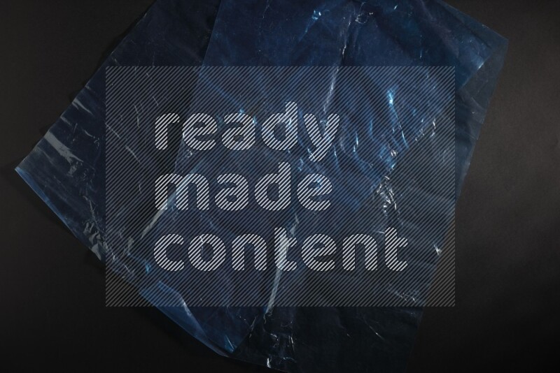 Colored plastic textures on black background