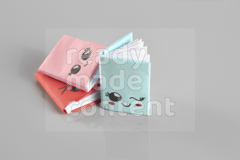 Origami book on grey background