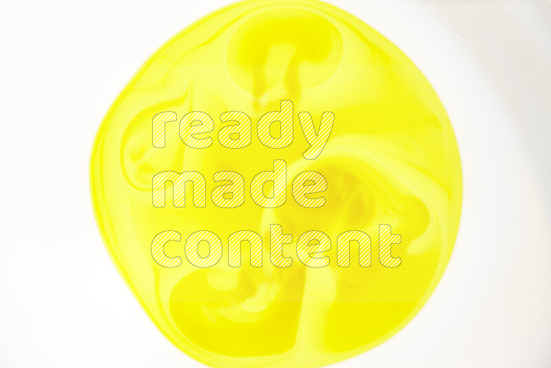 A close-up of abstract swirling patterns in yellow and white