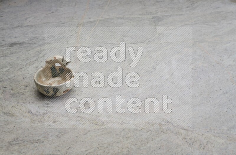 A pottery soap holder on grey marble background