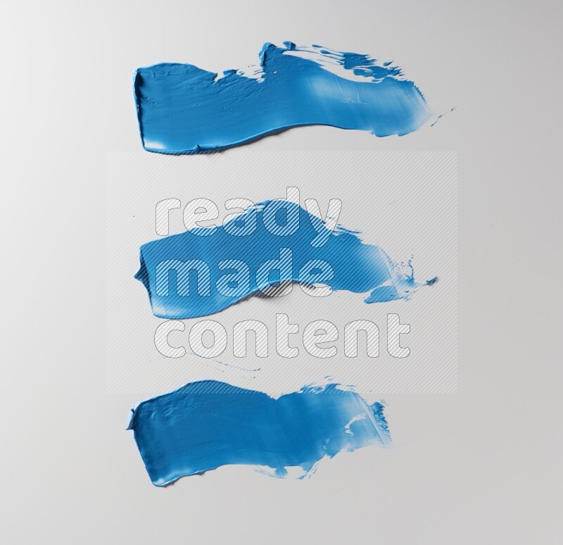 Blue zigzag painting knife strokes on white background