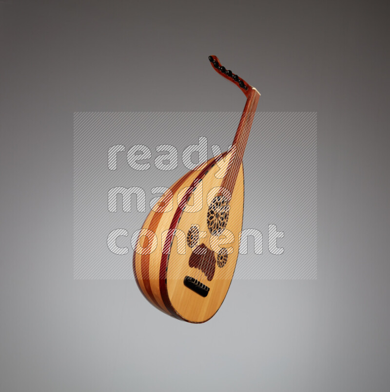 عودي خشبي بني على خلفية رمادية