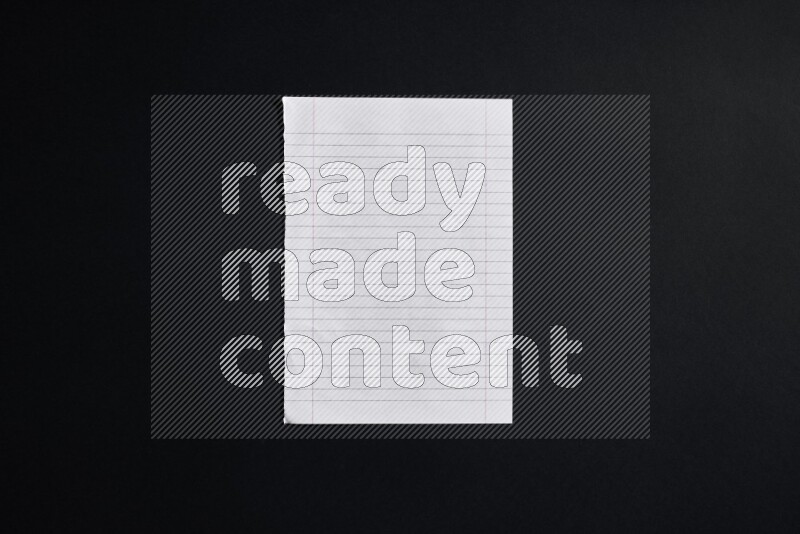 Notebook sheet on black background