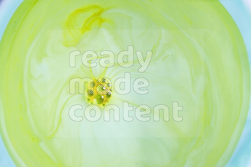 A close-up of abstract swirling patterns in green gradients