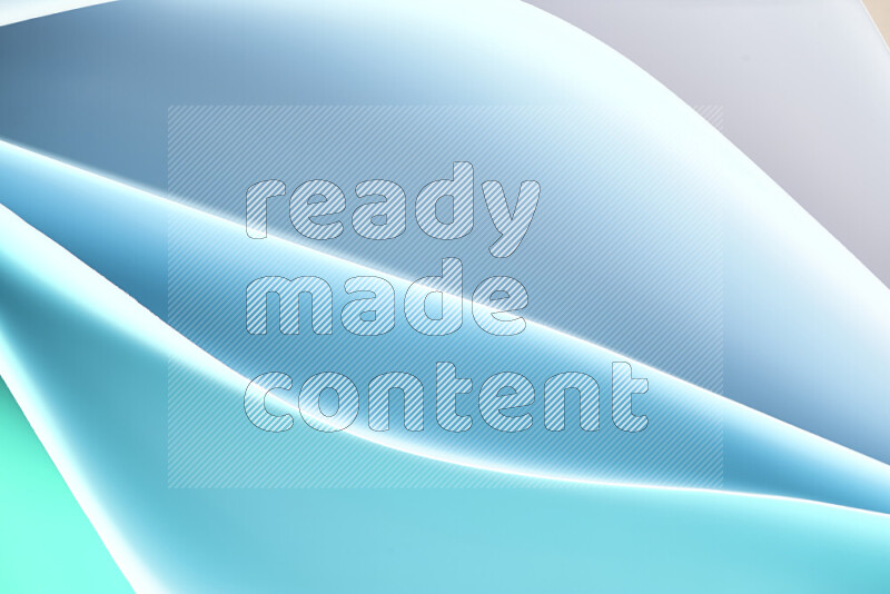 This image showcases an abstract paper art composition with paper curves in blue and white gradients created by colored light