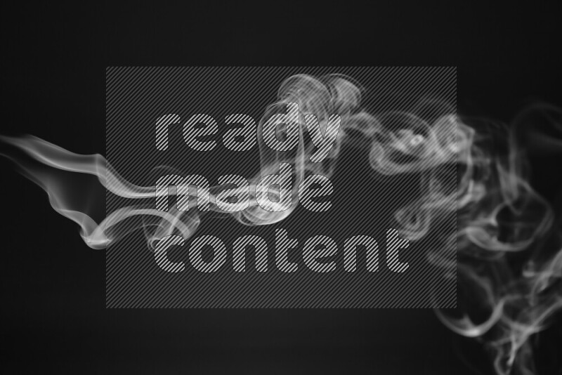 Motion of wavy smoke isolated on dark background