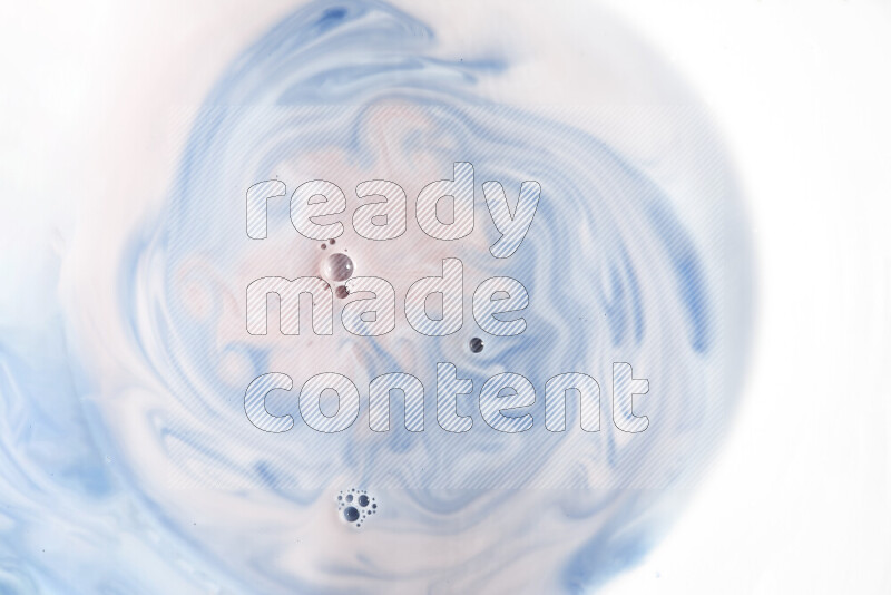 لقطة مقربة لأنماط دوامية باللون الأزرق والأحمر والأبيض