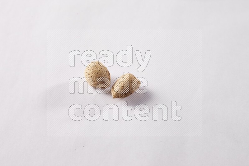 Almonds on white background