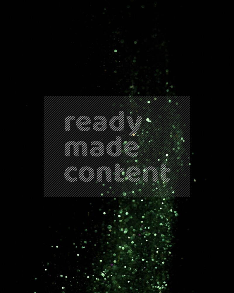 Green glitter powder isolated on black background
