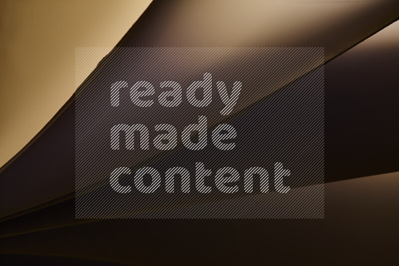 فن تجريدي يعرض منحنيات مع تدرجات الألوان الدافئة والباردة مكونه بضوء ملون