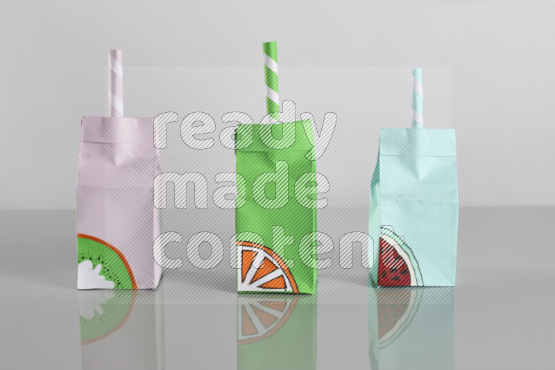 Origami juice box on grey background