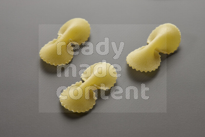 Fiocchi pasta on grey background