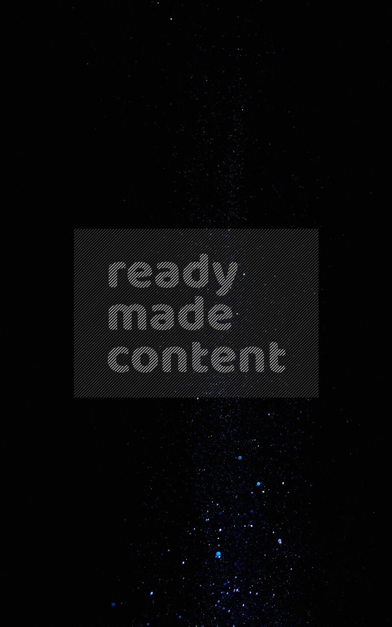 Blue glitter powder isolated on black background