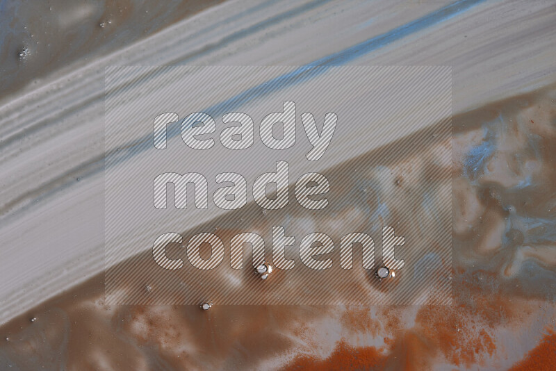 Abstract colorful background with mixed of orange and blue paint colors