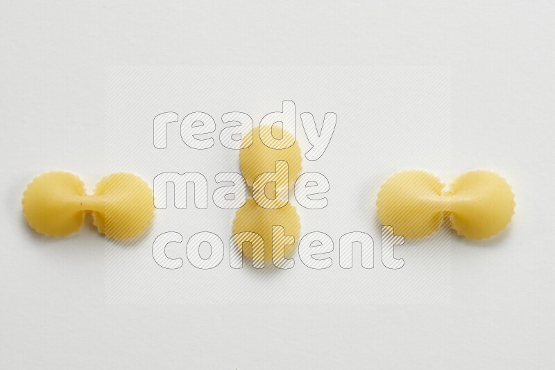 Fiocchi pasta on white background