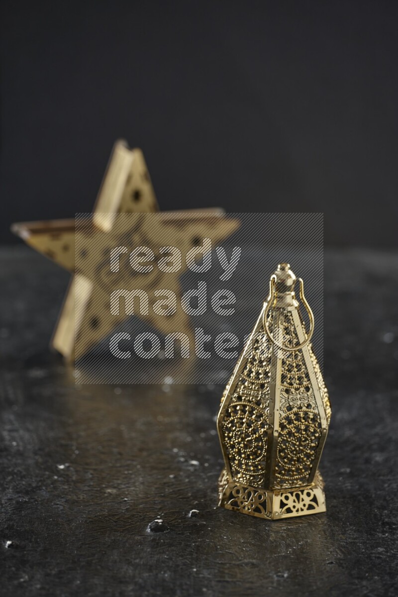 A star lantern with classic lantern on textured black background
