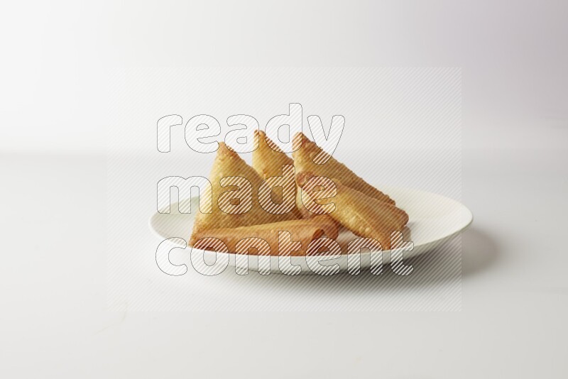 sambosas on a white background