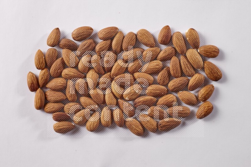 Almonds on white background