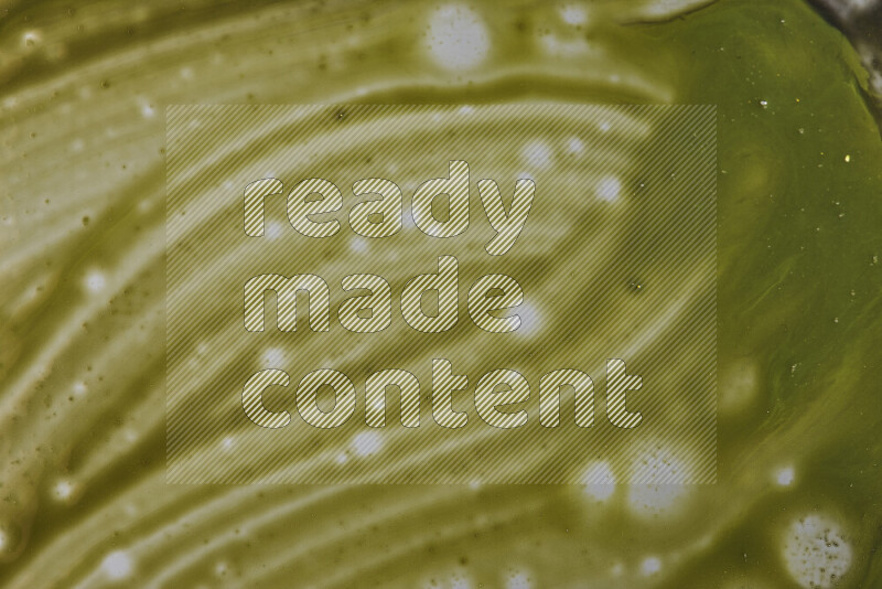 Close-ups of abstract green paint texture in different shapes