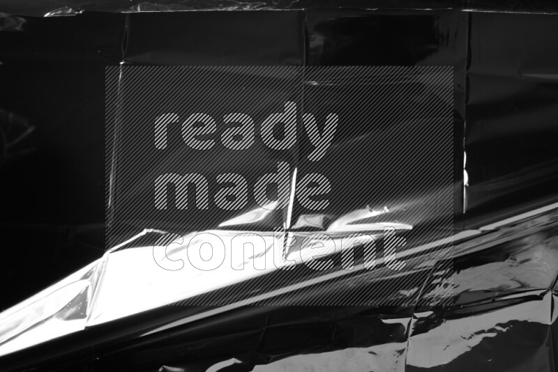 Plastic wrap texture on black background